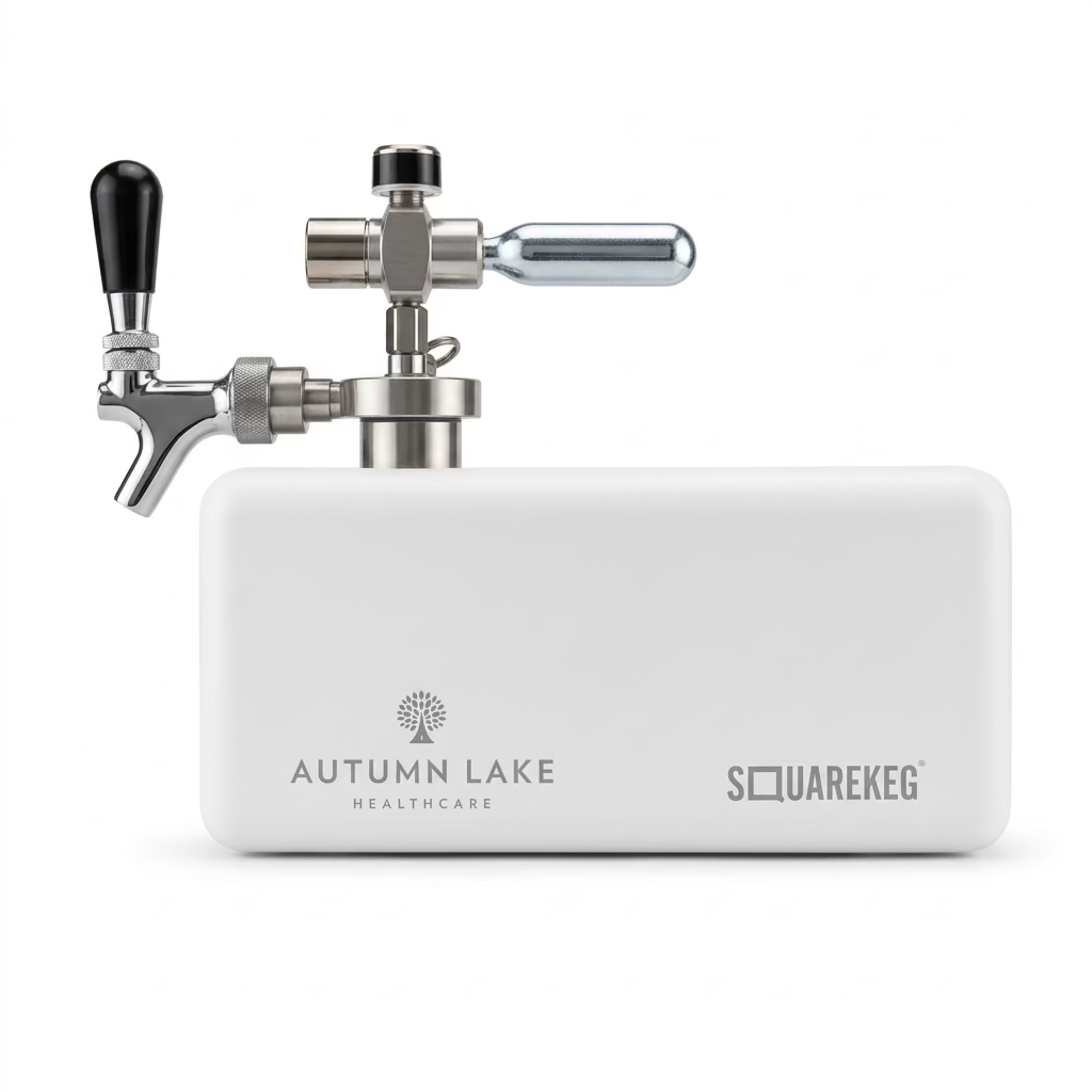 A white rectangular portable keg with a chrome faucet and black handle. The brand 'Autumn Lake HealthCare' is printed on the side.