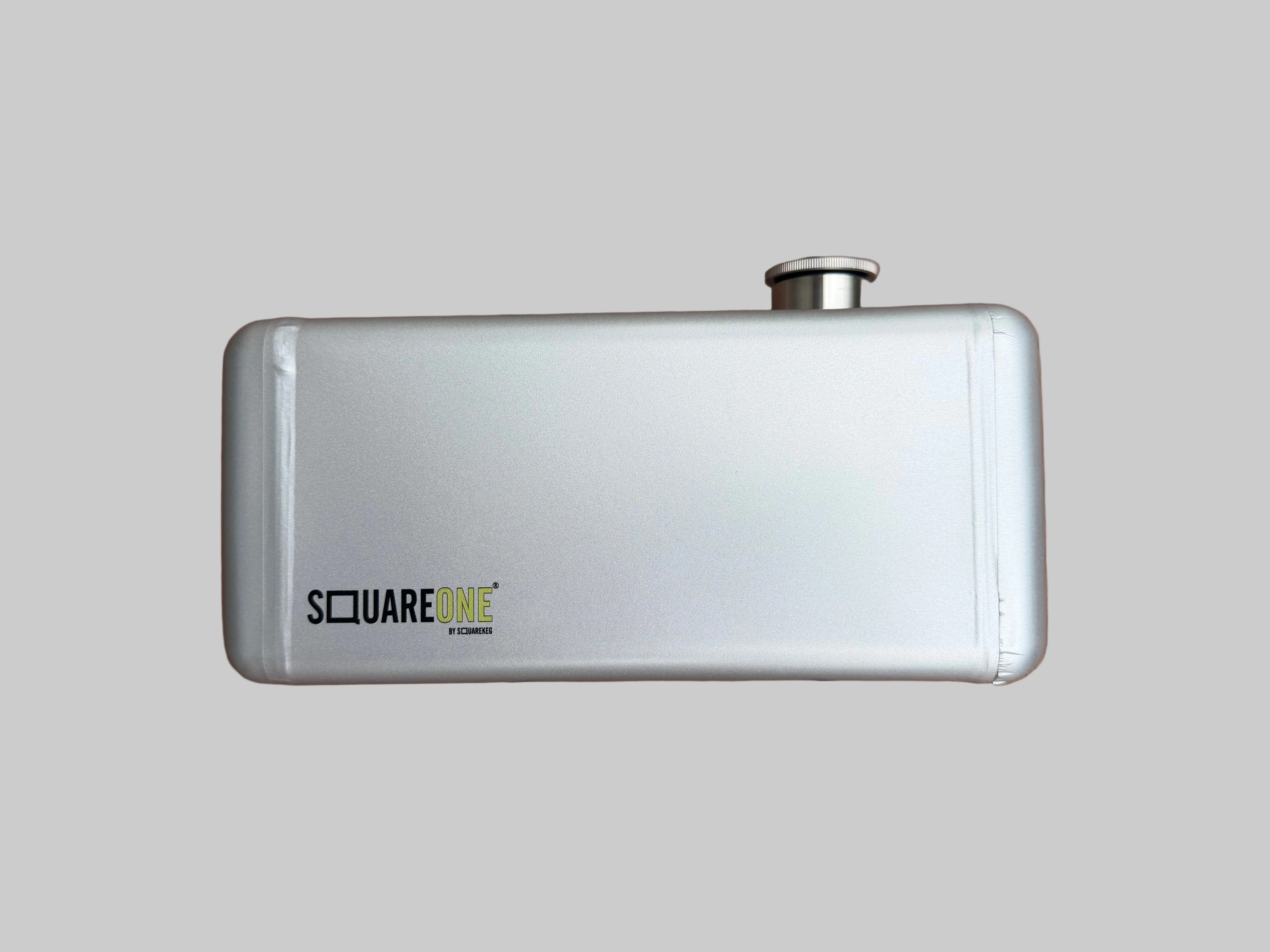 A silver Square One portable keg with a black and yellow logo